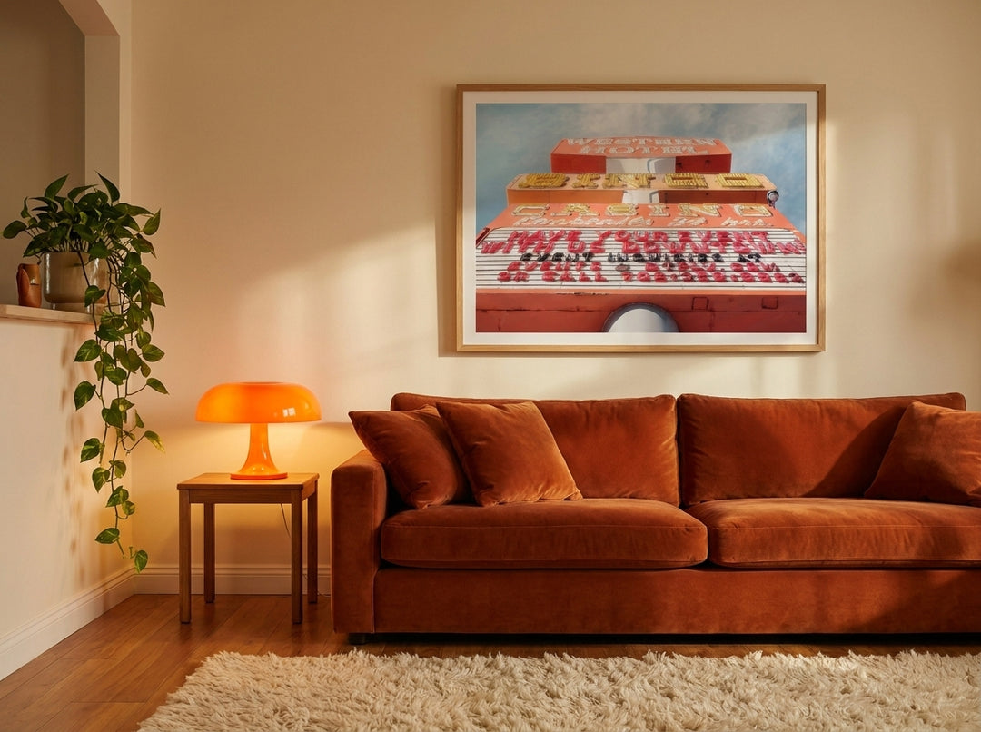 Modern wall art print styled on the wall in a retro 70s living room