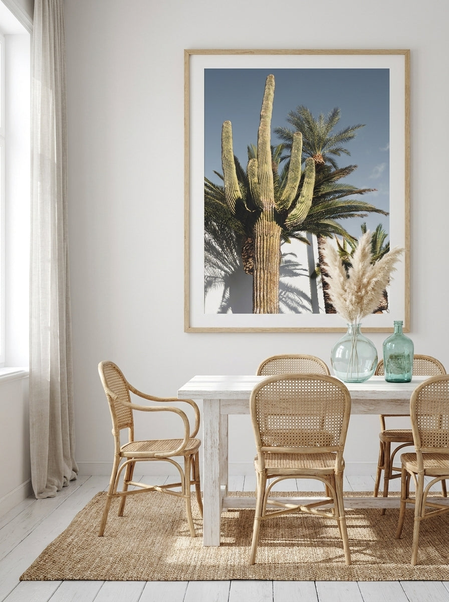 Oversized statement modern wall art print styled on the wall in a coastal dining room