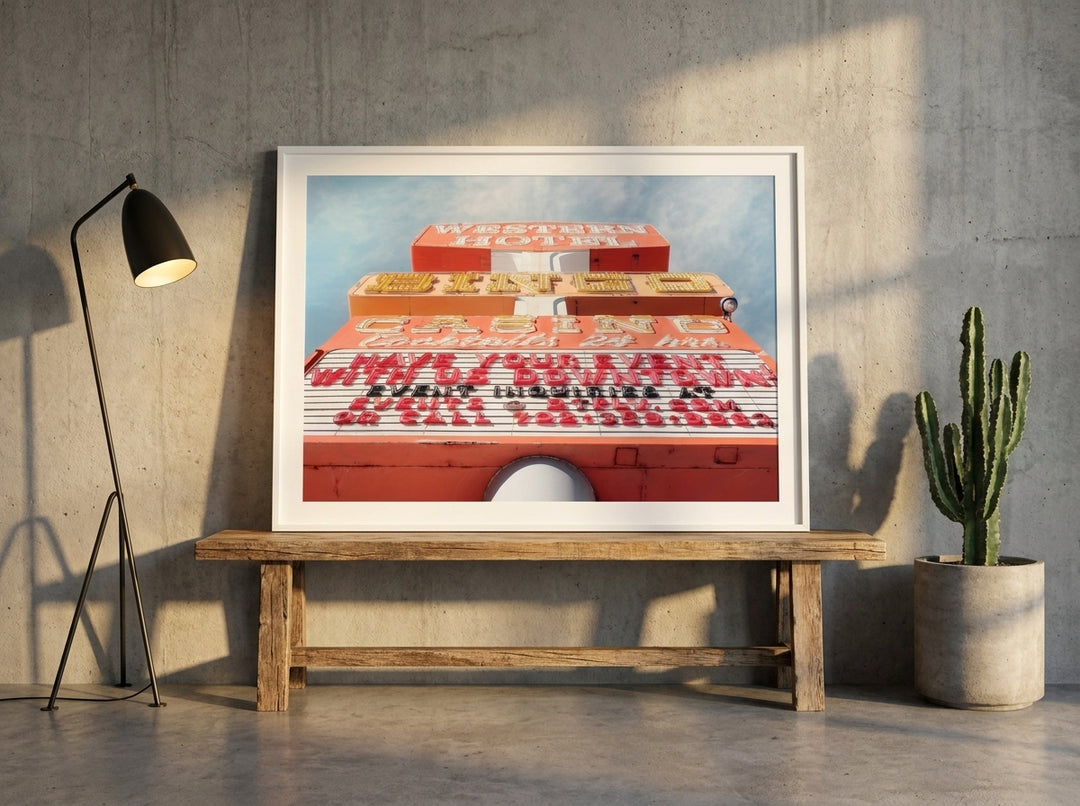 Modern wall art print standing on a bench in an industrial loft home office