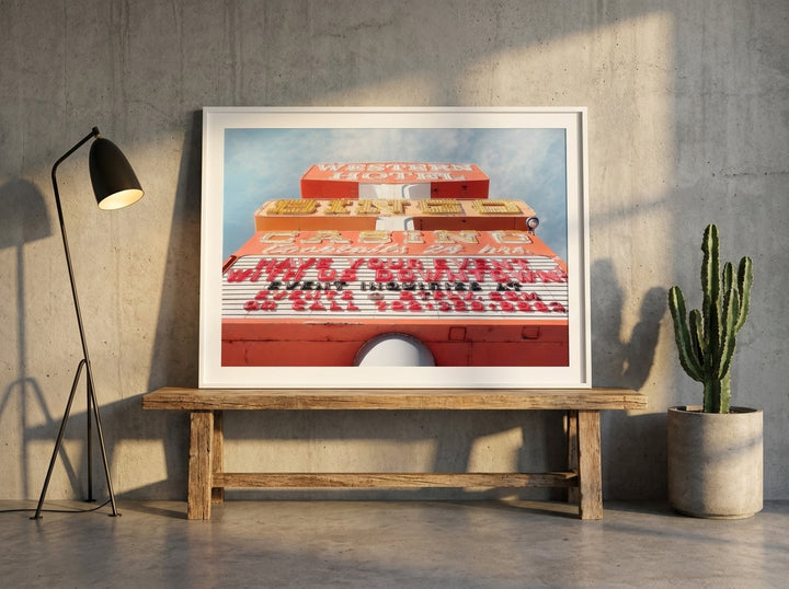 Modern wall art print standing on a bench in an industrial loft home office