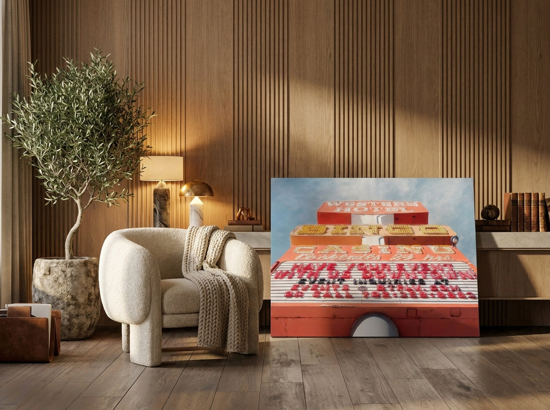 Stretched canvas wall art leaning against the wall in a luxe home office
