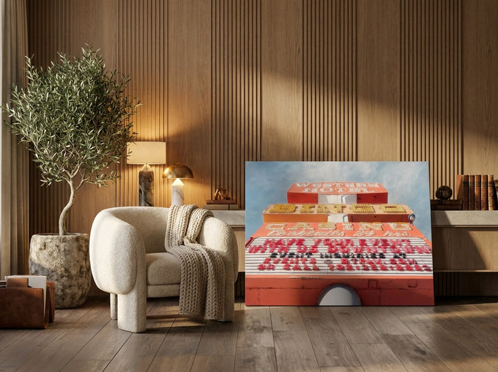 Stretched canvas wall art leaning against the wall in a luxe home office