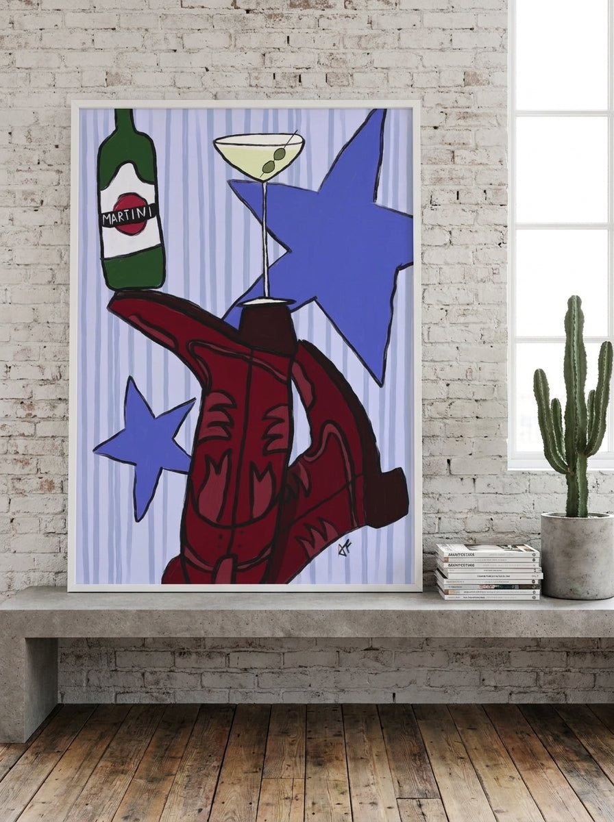 Modern wall art print standing on a kitchen bench in an industrial loft kitchen