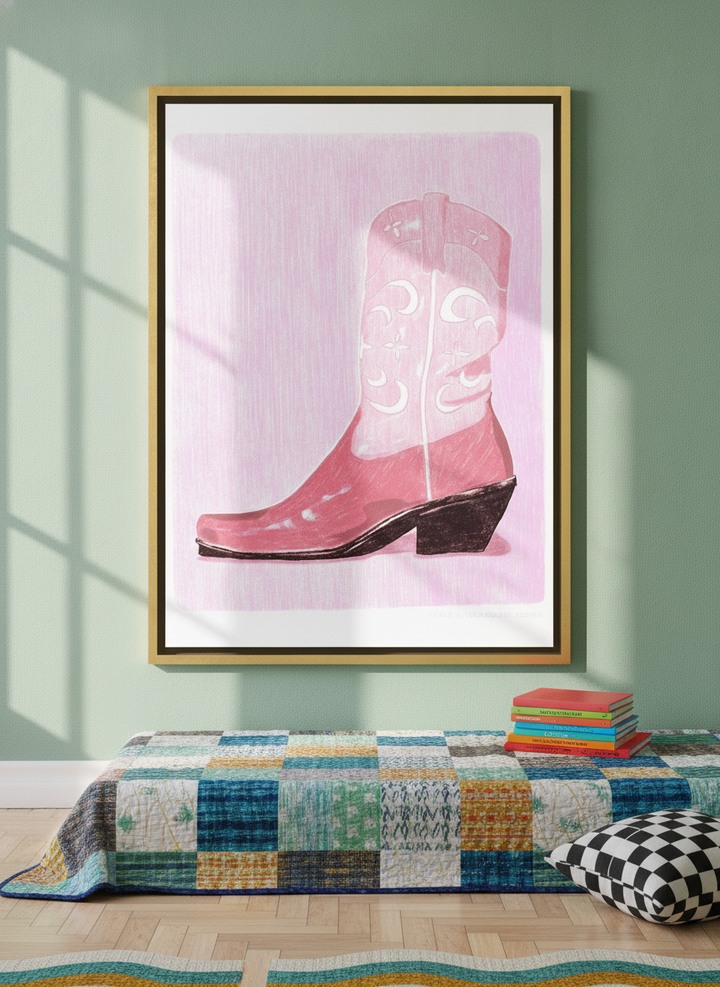 Canvas wall art with a gold leaf surround styled on the wall in a colourful eclectic bedroom