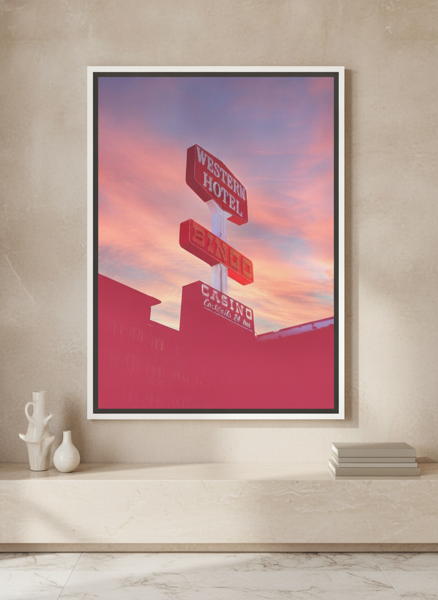 Canvas wall art with a white surround standing on a console in a luxe home office