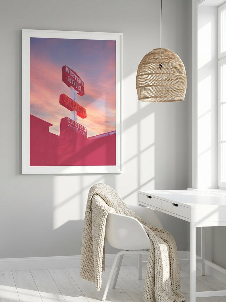 Modern wall art print styled on the wall in a bright Scandinavian home office
