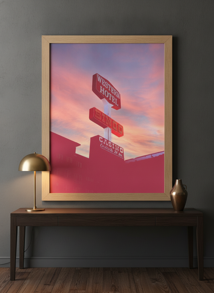 Modern wall art print styled on the wall in a moody home office