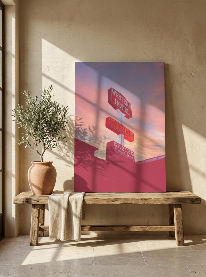 Stretched canvas wall art standing on a bench in a Mediterranean living room