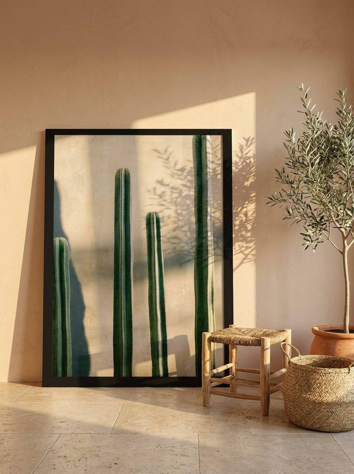 Oversized statement modern wall art print leaning against the wall in a Mediterranean bedroom