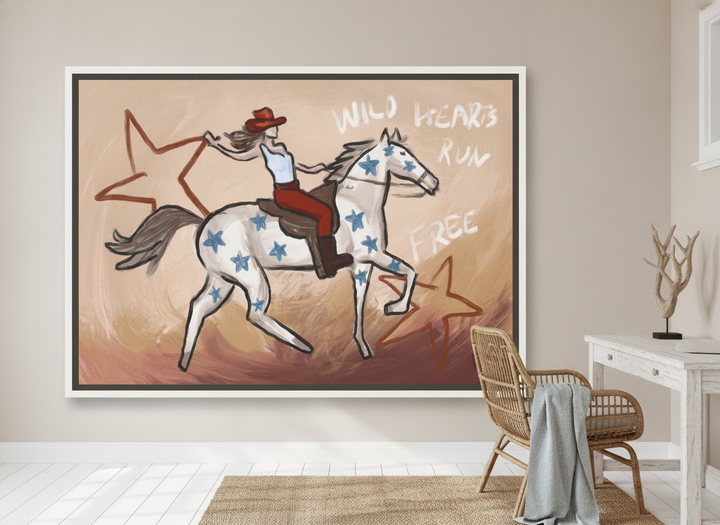 Oversized statement canvas wall art with a white surround styled on the wall in a coastal home office