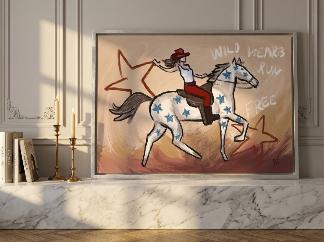 Canvas wall art with a silver leaf surround standing on a kitchen bench in a Parisian kitchen