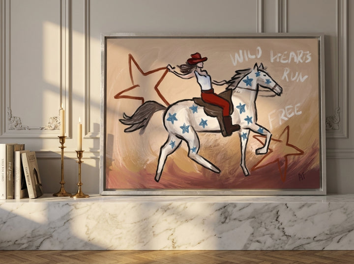 Canvas wall art with a silver leaf surround standing on a kitchen bench in a Parisian kitchen