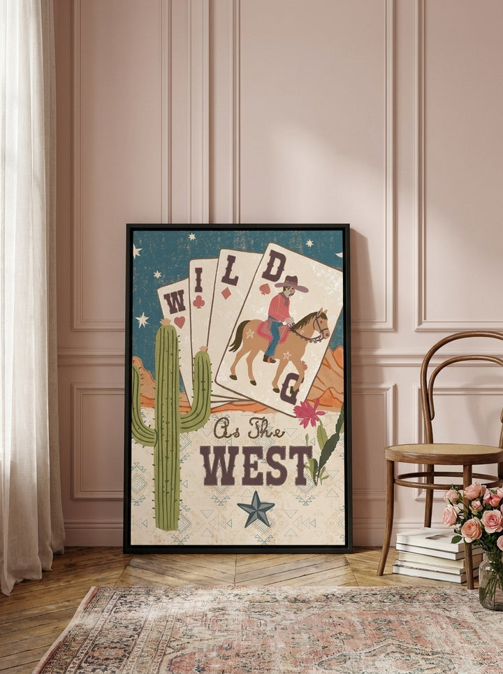 Canvas wall art with a black surround leaning against the wall in a Parisian home office