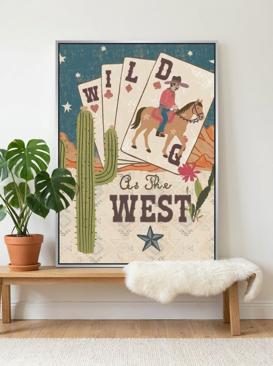 Canvas wall art with a silver leaf surround standing on a bench in a bright Scandinavian bedroom