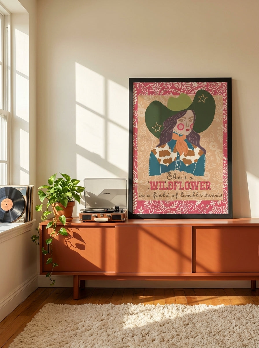 Modern wall art print standing on a sideboard in a retro 70s bedroom