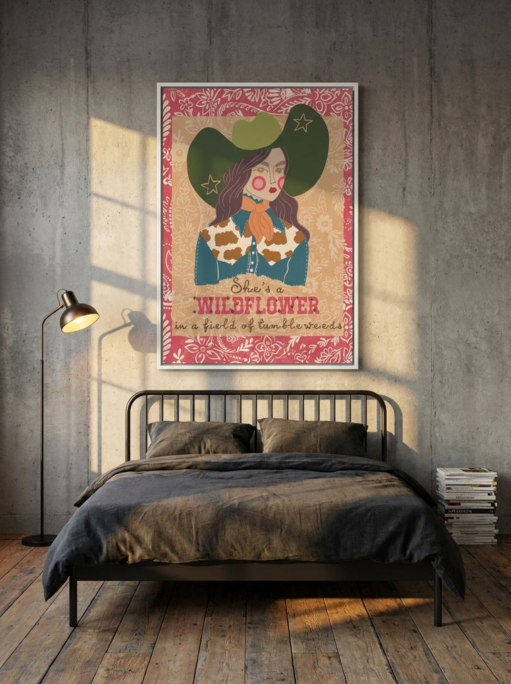 Canvas wall art with a white surround styled on the wall in an industrial loft bedroom