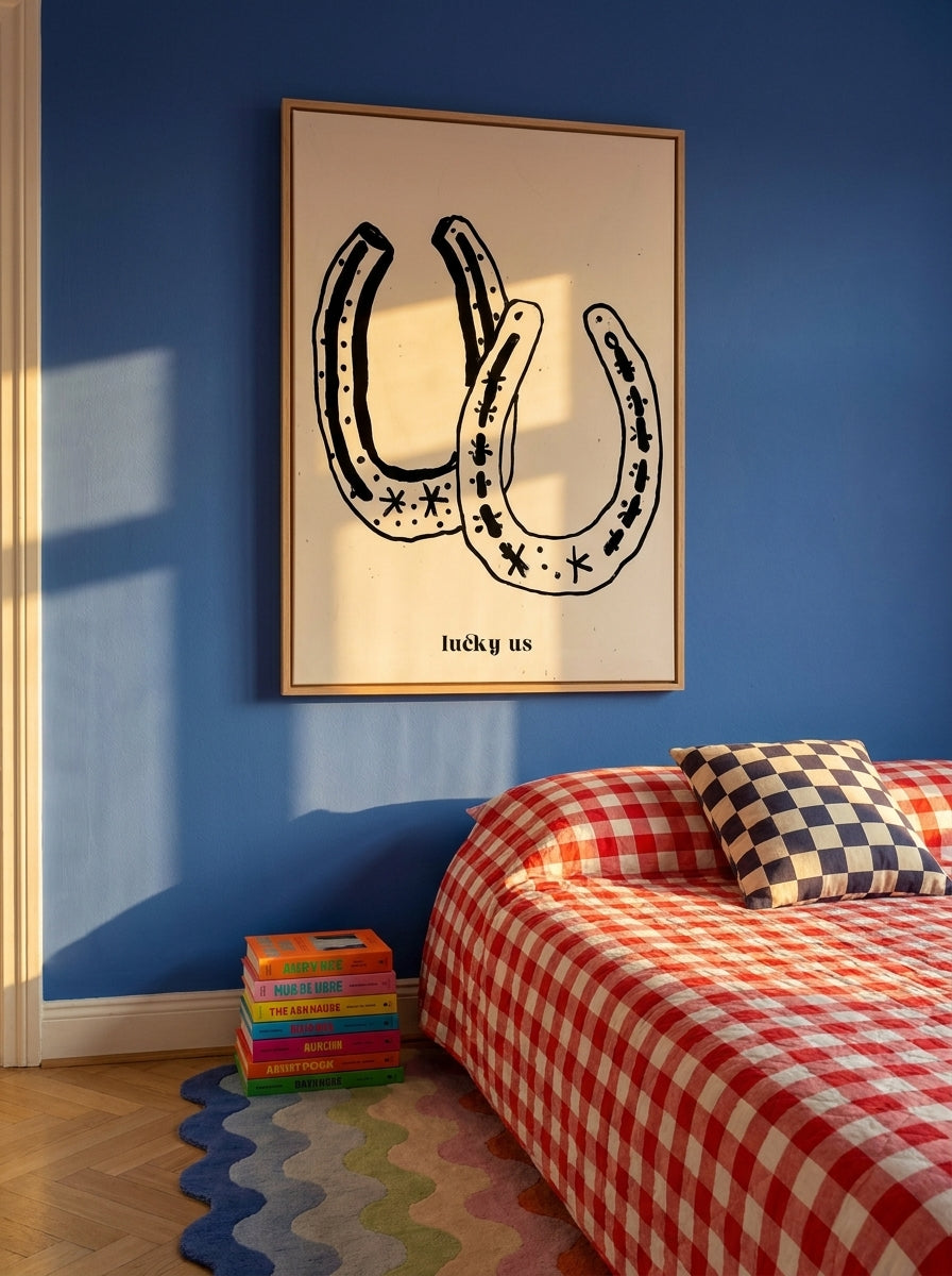 Oversized statement canvas wall art with a natural timber surround styled on the wall in a colourful eclectic bedroom