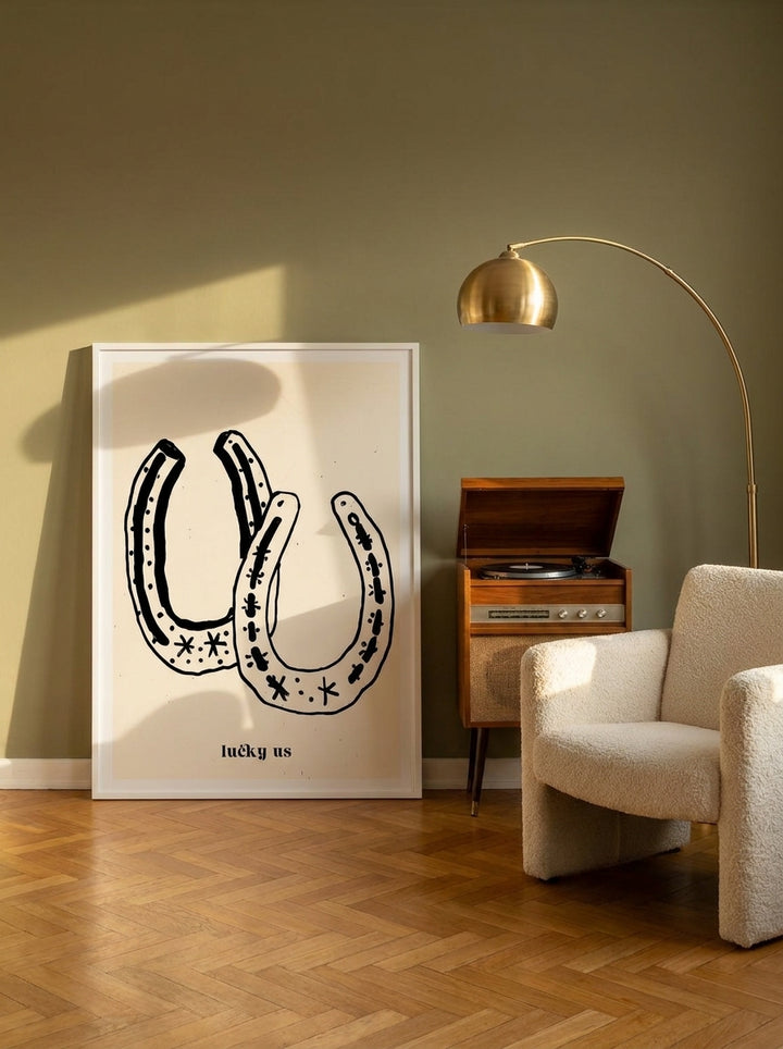Modern wall art print leaning against the wall in a mid-century bedroom