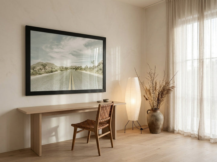 Oversized statement modern wall art print styled on the wall in a warm Japandi home office