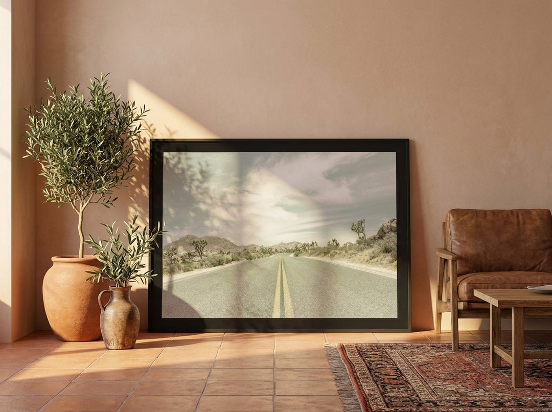 Modern wall art print leaning against the wall in a Mediterranean living room