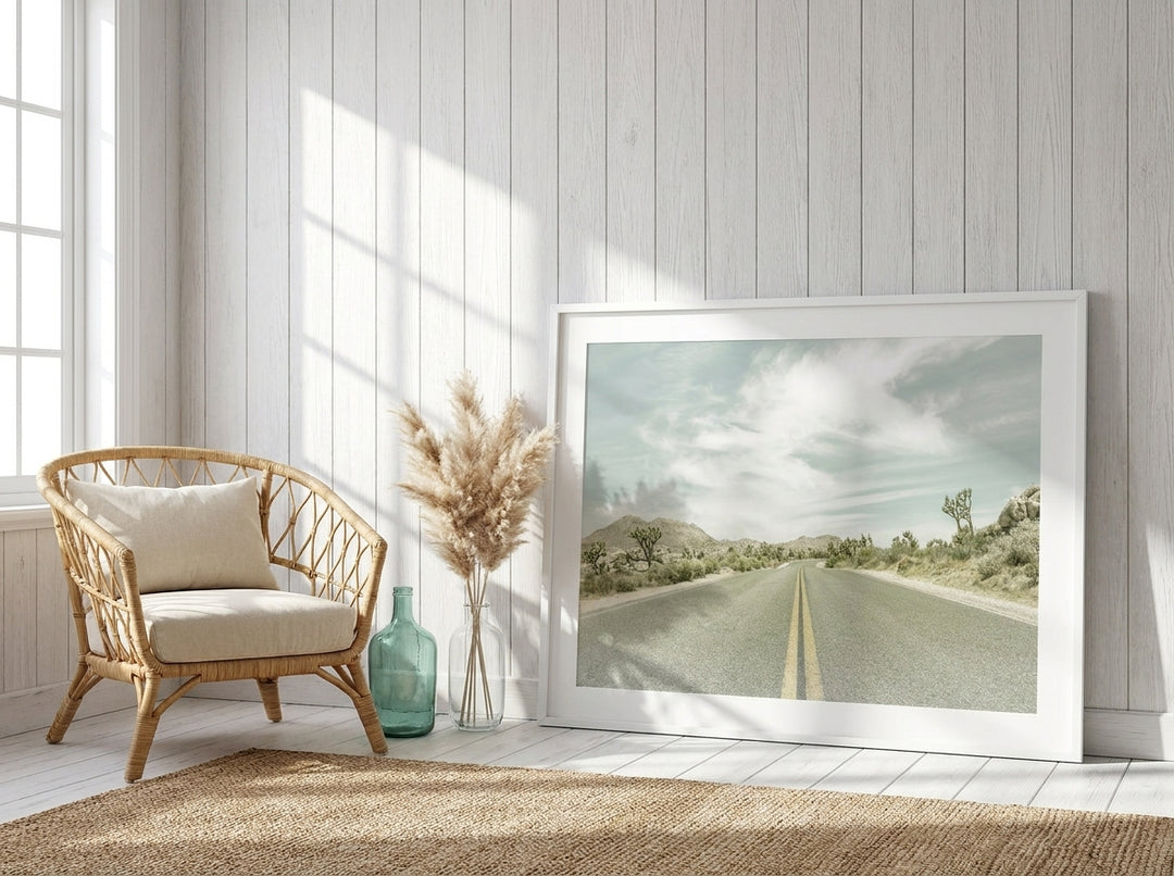 Modern wall art print leaning against the wall in a coastal home office