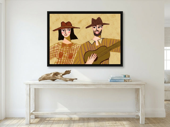Canvas wall art with a black surround styled on the wall in a coastal living room