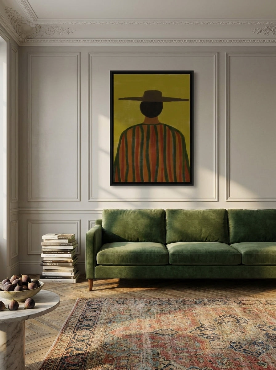 Oversized statement canvas wall art with a black surround styled on the wall in a Parisian living room