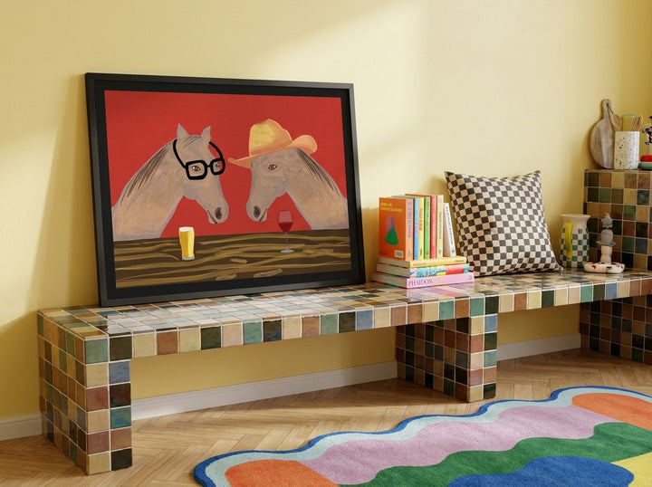 Modern wall art print standing on a kitchen bench in a colourful eclectic kitchen