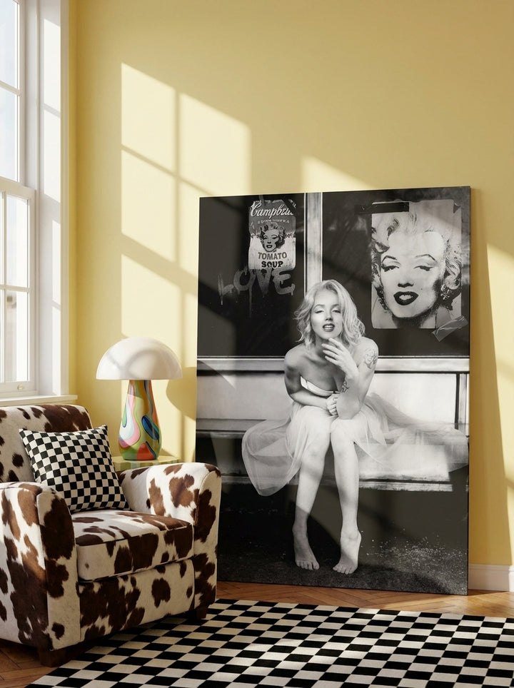 Stretched canvas wall art leaning against the wall in a colourful eclectic dining room