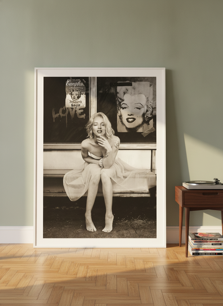 Oversized statement modern wall art print leaning against the wall in a mid-century living room