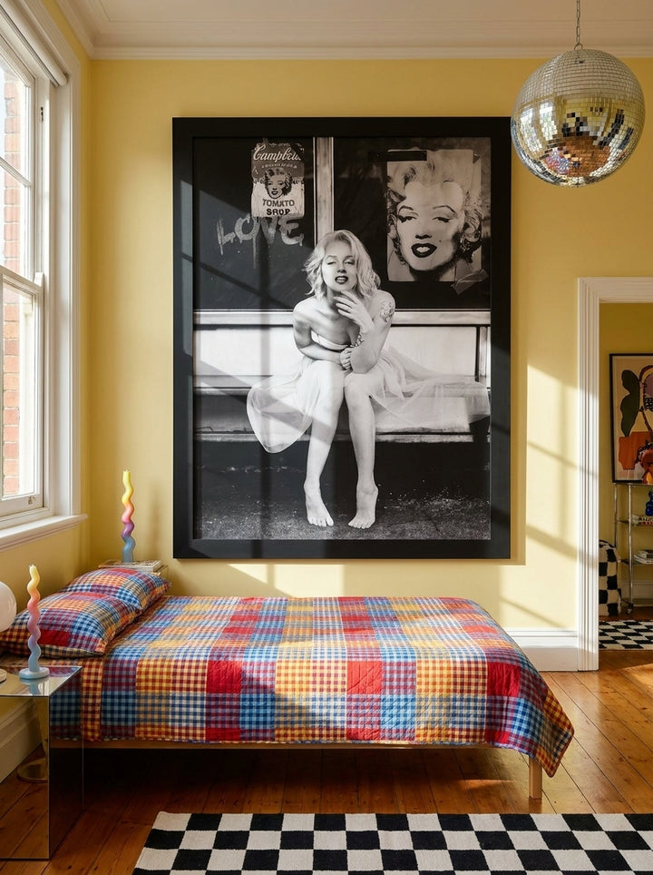 Oversized statement modern wall art print styled on the wall in a colourful eclectic bedroom