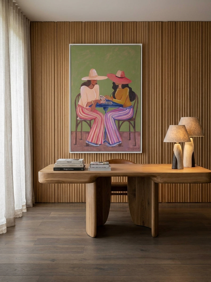 Canvas wall art with a white surround styled on the wall in a luxe home office
