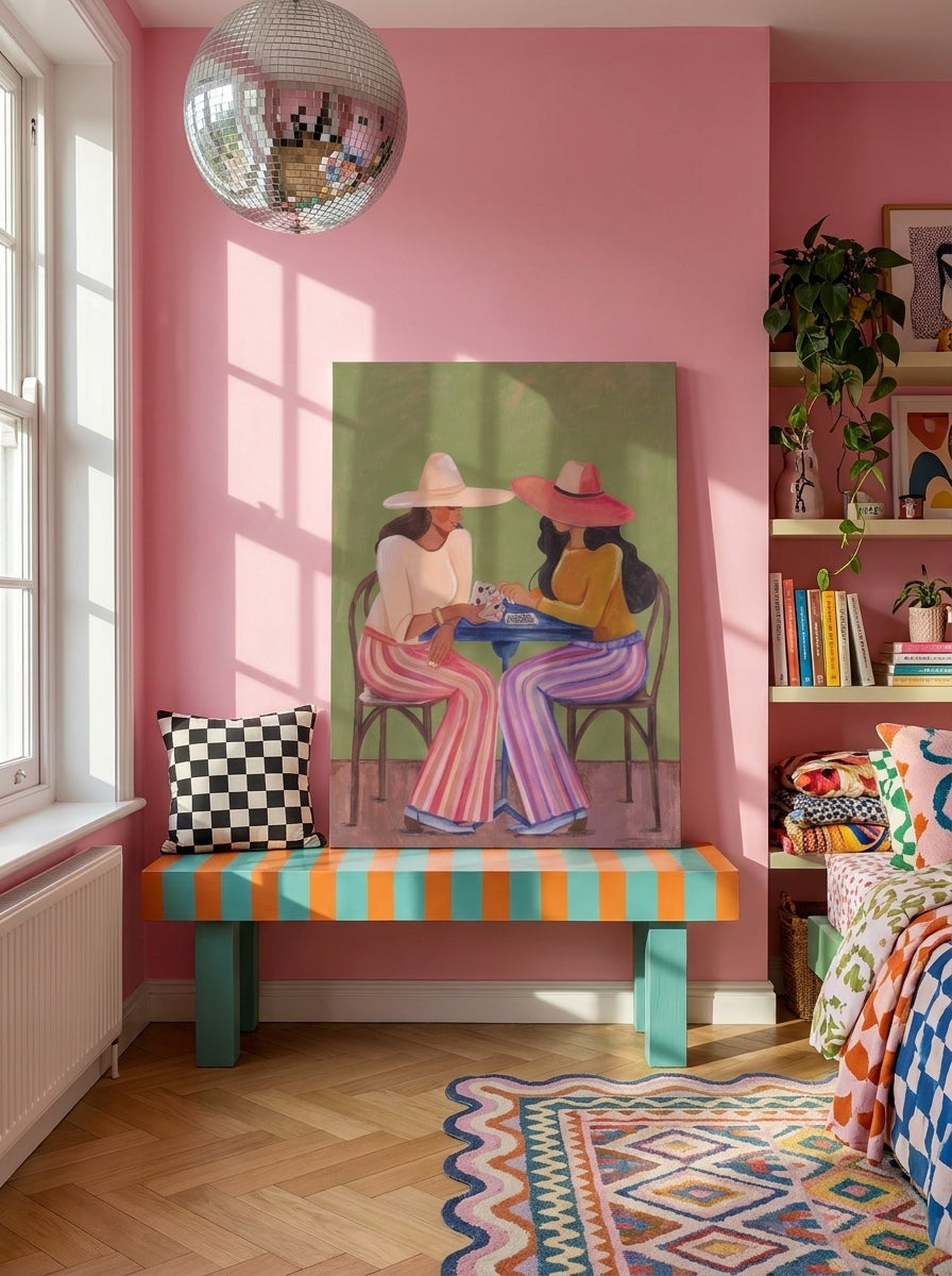 Stretched canvas wall art standing on a side table in a colourful eclectic bedroom