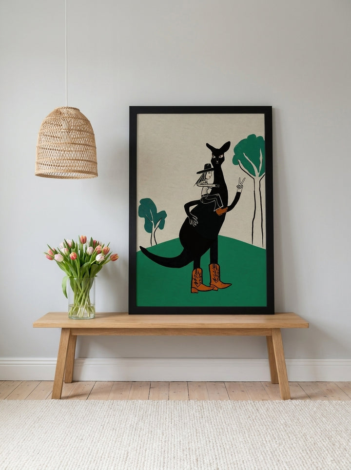 Modern wall art print standing on a bench in a bright Scandinavian home office