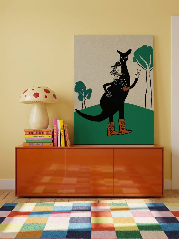 Stretched canvas wall art standing on a sideboard in a colourful eclectic bedroom