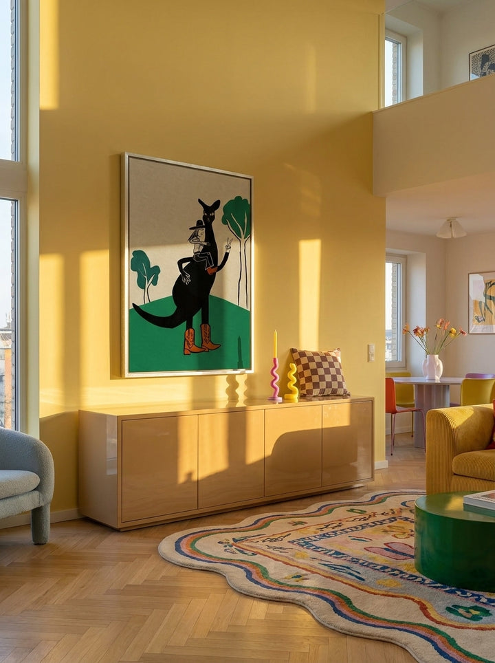 Oversized statement canvas wall art with a silver leaf surround styled on the wall in a colourful eclectic living room