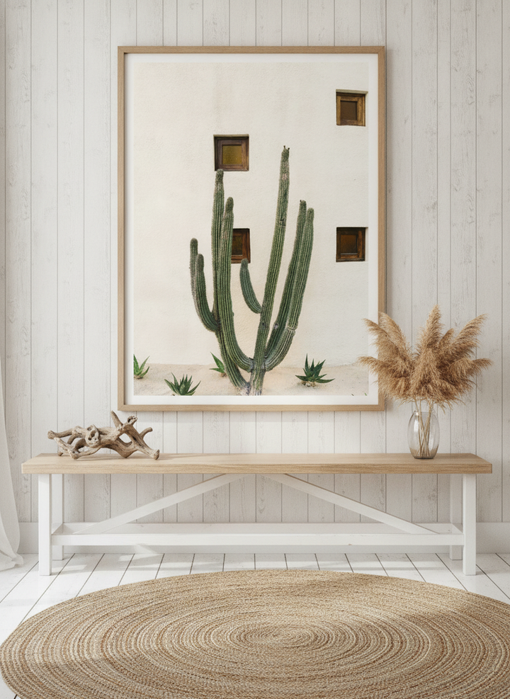 Oversized statement modern wall art print styled on the wall in a coastal living room
