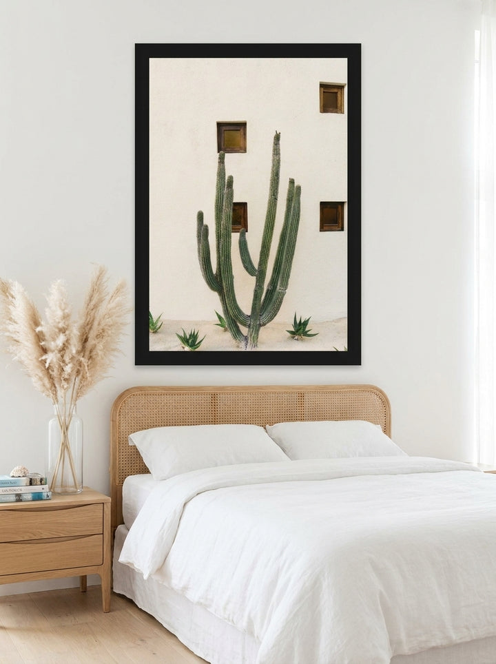 Oversized statement modern wall art print styled on the wall in a coastal bedroom