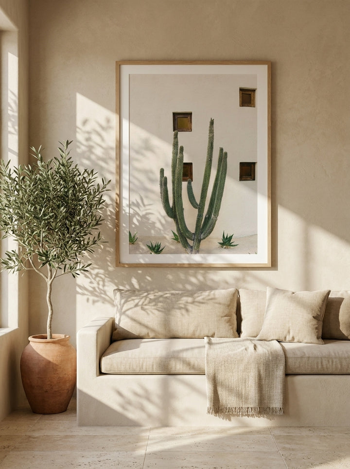 Modern wall art print styled on the wall in a Mediterranean living room
