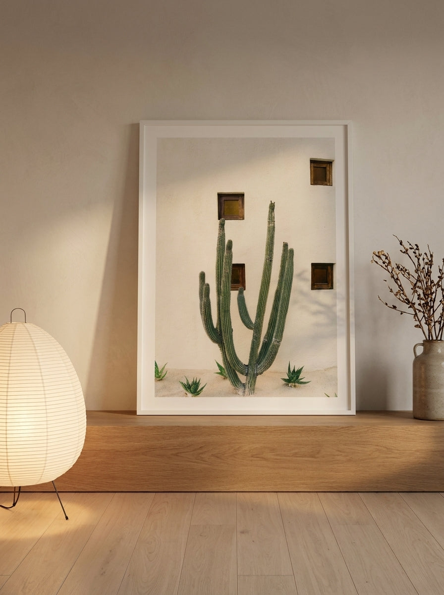 Modern wall art print standing on a shelf in a warm Japandi home office