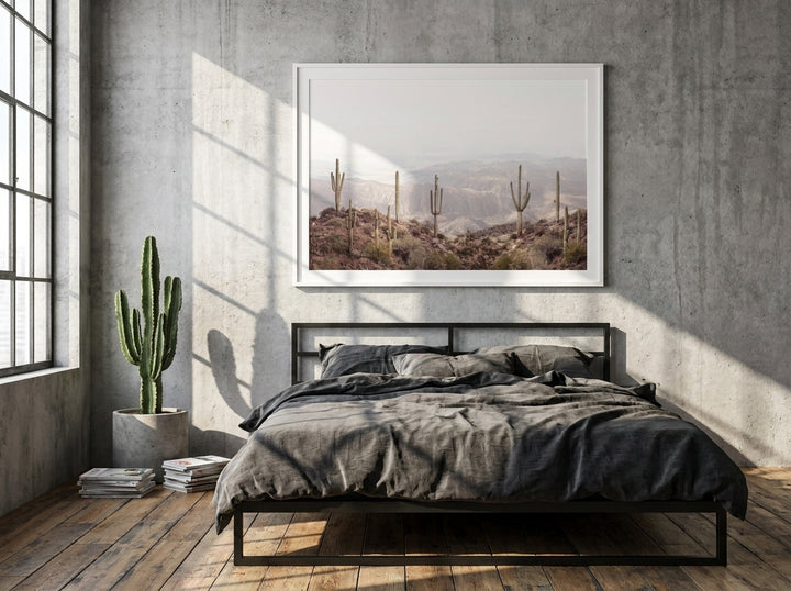 Modern wall art print styled on the wall in an industrial loft bedroom