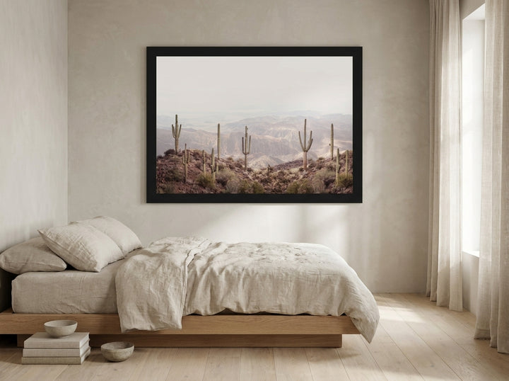 Oversized statement modern wall art print styled on the wall in a warm Japandi bedroom