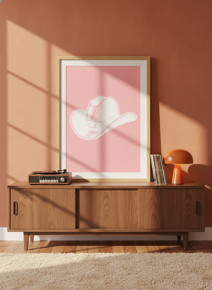 Modern wall art print standing on a sideboard in a retro 70s living room