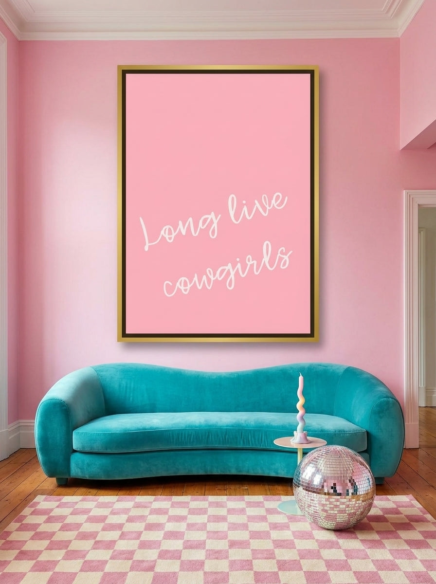 Oversized statement canvas wall art with a gold leaf surround styled on the wall in a colourful eclectic living room