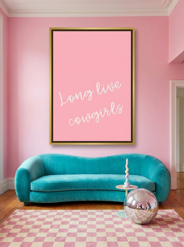 Oversized statement canvas wall art with a gold leaf surround styled on the wall in a colourful eclectic living room
