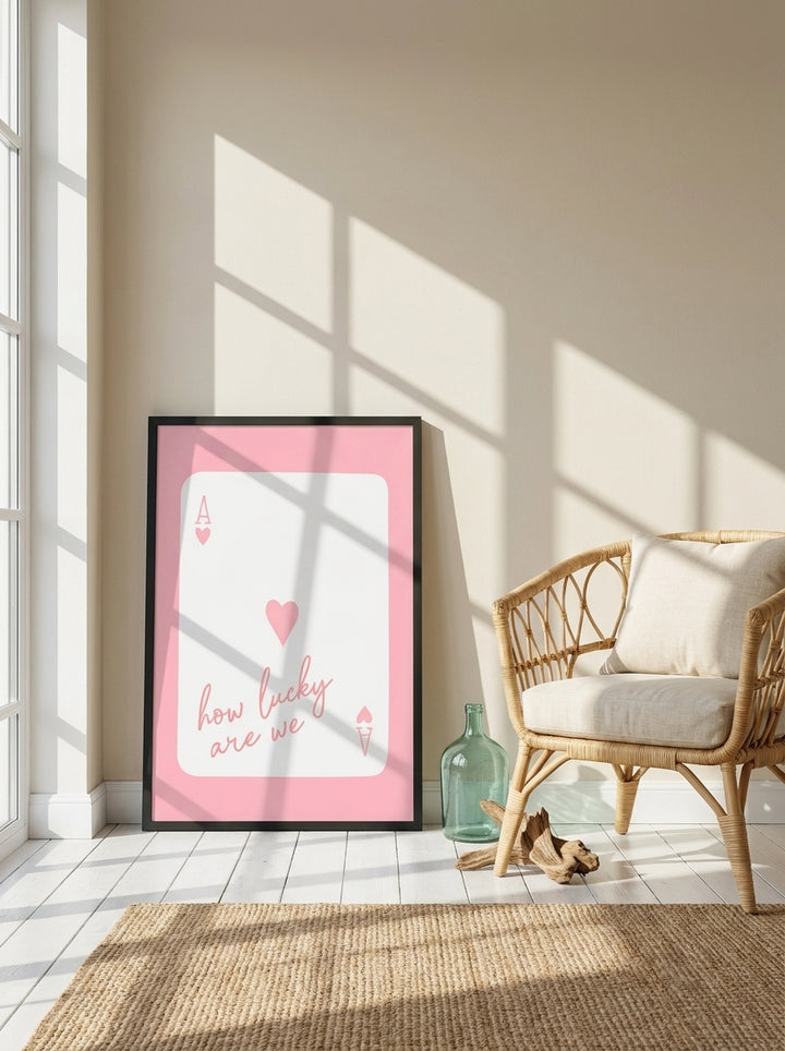 Modern wall art print leaning against the wall in a coastal bedroom