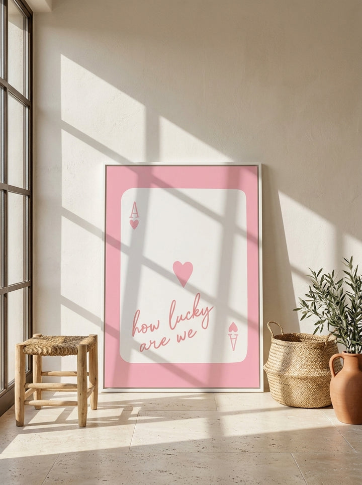 Oversized statement canvas wall art with a white surround leaning against the wall in a Mediterranean living room