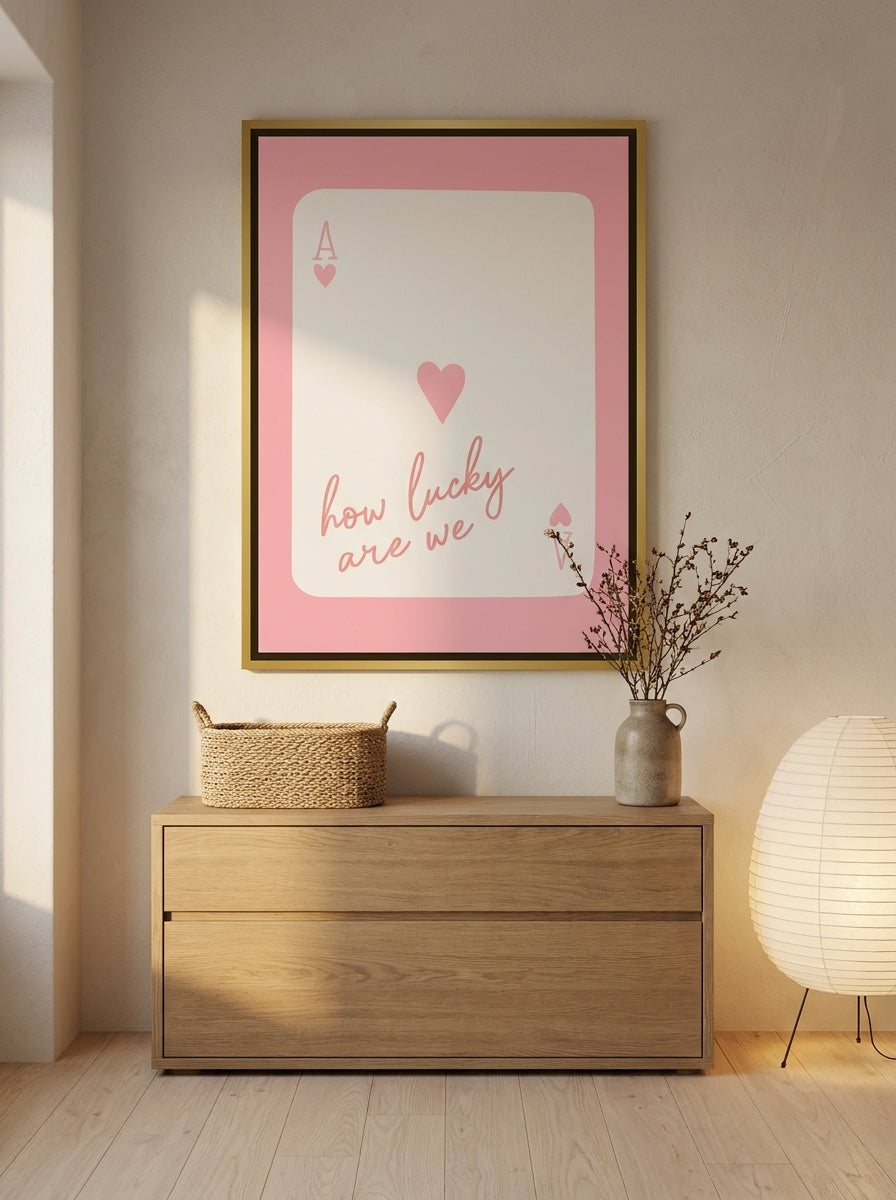 Canvas wall art with a gold leaf surround styled on the wall in a warm Japandi nursery