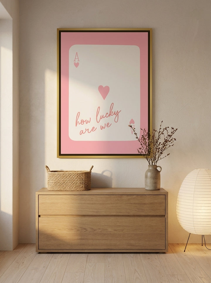 Canvas wall art with a gold leaf surround styled on the wall in a warm Japandi nursery
