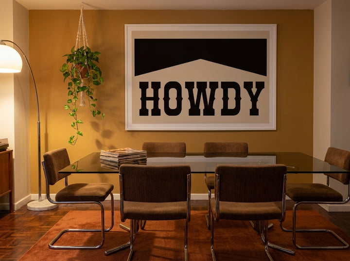 Oversized statement modern wall art print styled on the wall in a retro 70s dining room